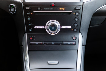 Obraz na płótnie Canvas Control buttons in interior of a modern car