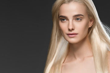 Fototapeta premium Woman blonde hair beautiful face healthy skin