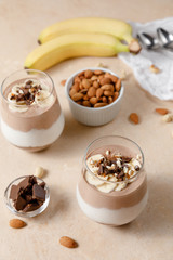Chia seeds pudding with chocolate and banana smoothie in a glass