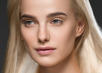 Fototapeta premium Woman blonde hair beautiful face healthy skin