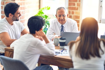 Group of business workers working together at the office