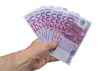 A fan of 500 five hundred euros. The hand of a European man holds a fan of European money. Isolated white background. Close-up.