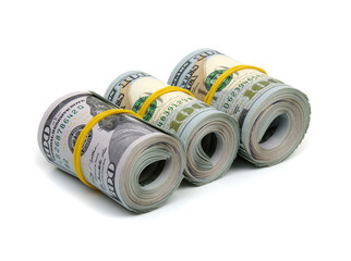 Hundred dollar bills rolled up with rubberband
