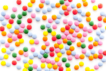 Color candy on white background top view
