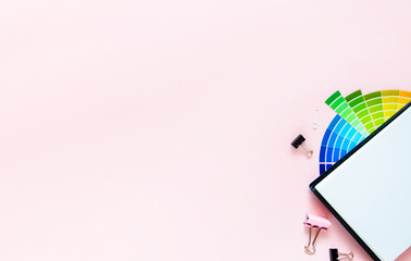 Color palett spectrum fans laying on pank background. Top horizontal view copyspace stationery....