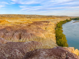 Colorful Rainbow Beach, or Wucaitan, Located along the Irtysh (Ertix) River in northern Xinjiang, a...