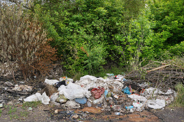 background of rusty and oxidized old objects scattered in the environment and highly polluting