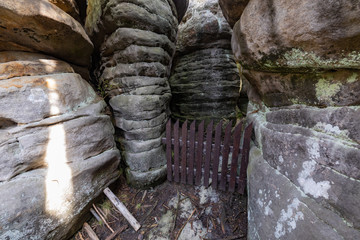Fototapeta premium Stolowe Mountains National Park. Path in Rock Labyrinth hiking trail Bledne Skaly. Errant Rocks in Sudetes Mountains near Kudowa-Zdroj, Lower Silesia, Poland.