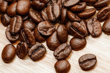 Roasted coffee beans close up background

