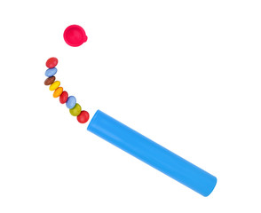 Different sizes of colorful candies on white background