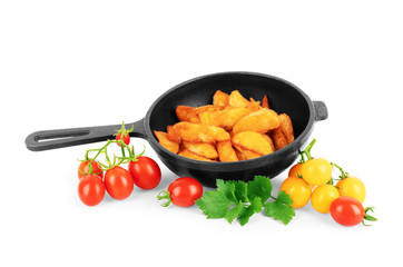 frying pan with potatoes meat and roast onion on black concrete background. food concept. potatoes fried in a pan