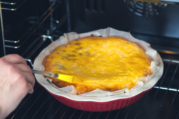 Oven baked cottage cheese casserole. In red baking dish