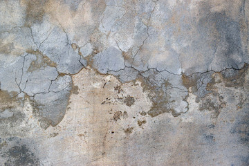 Cement-adhesive texture of the wall. Plaster work with divorces.