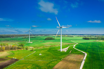 Green fields and wind turbines, view from above