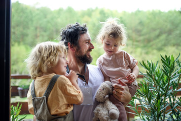 Father doctor finally at home meeting his children, end of coronavirus.