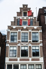 Old traditional leaning house in Amsterdam, Netherlands
