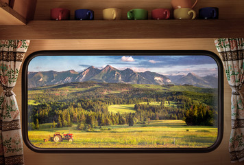 Sunset at Belianske in Tatra mountains, view from camper window © shaiith