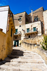 Narrow steep stairway street in the old town of Matera, Province of Matera, Basilicata Region, Italy