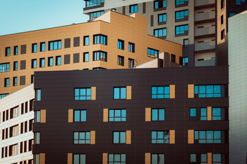 Modern residential area. Fragments of new elite residential buildings or a shopping complex. Part of modern urban real estate