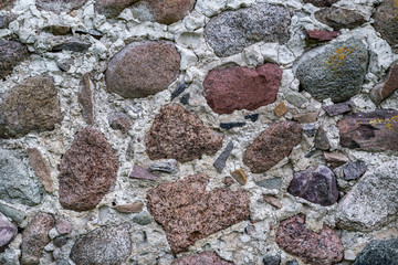 surface of an old wall of huge stones of a destroyed building