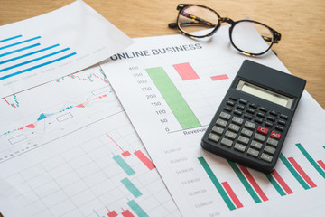 Young business busy working, entrepreneur analyzing financial information as graphics