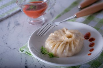 A delicious, diet dish. Steam dumplings. Khinkali Georgian.