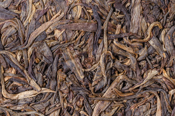 Special chinese tea puer, tea leaf on wooden table