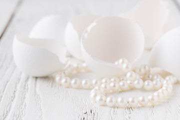 Pile of pearls on the white background