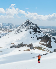 Hiker in the snowy mountains.