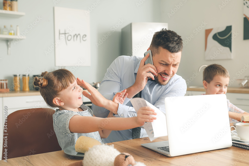 Poster Little children keeping father from his work at home