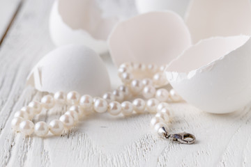 Pile of pearls on the white background