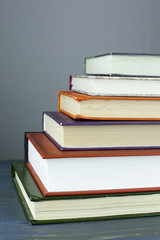 A pile of books with library