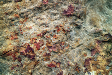 ancient heavy rust copper granite stone surface of cave for interior wallpaper