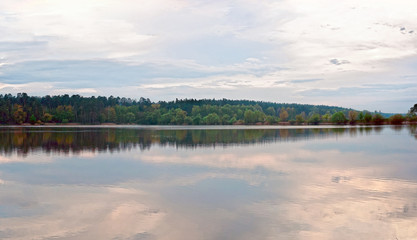 panorama landscape of green forest on the shore of a large lake. Pond 15, known as the 5 glade. Kyiv, Ukraine