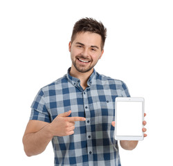 Young man with tablet computer on white background