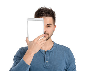 Young man with tablet computer on white background