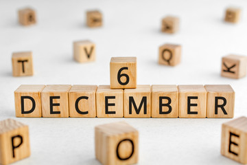 December 6 - from wooden blocks with letters, important date concept, white background random...