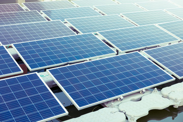 solar panels place on river to produce energy
