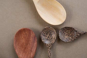 Close up spoon wooden on wood texture.