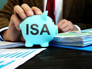Man proposes piggy bank with word ISA individual savings account.