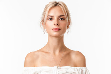 Image of beautiful blonde woman posing and looking at camera