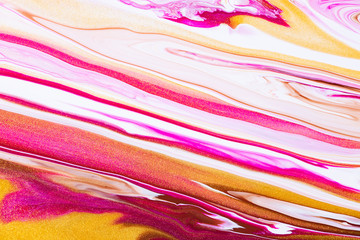 Fototapeta na wymiar Fluid art texture. Abstract backdrop with swirling paint effect. Liquid acrylic picture with flows and splashes. Mixed paints for background or poster. Golden, white and ruby overflowing colors