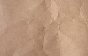 Naklejka premium Brown crumpled paper texture background.