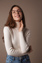 Photo of happy beautiful woman posing and smiling at camera
