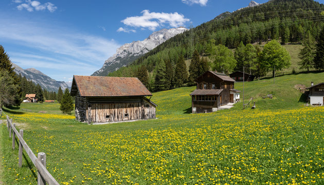 view of an idyllic mountain valley in the heart of the Swiss Alps