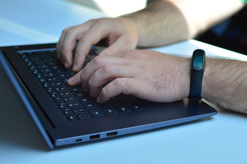 computer work, keyboard and hands close-up
