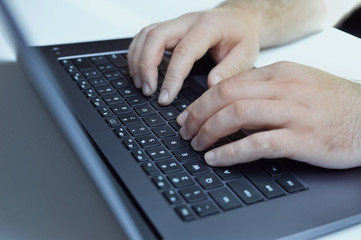 computer work, keyboard and hands close-up