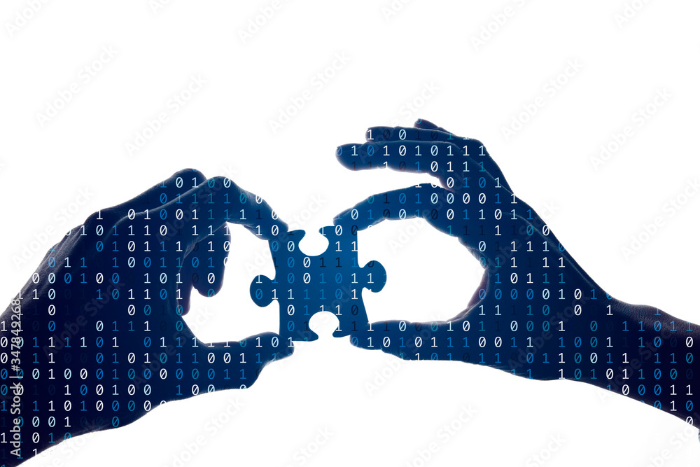 Poster silhouette of a hands holding a jigsaw puzzle piece with binary background