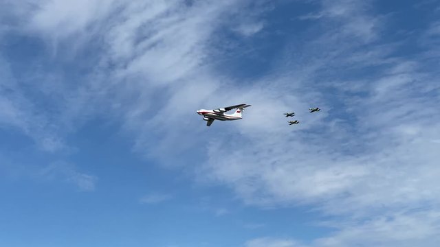May 7, 2020 - Belarus, Minsk - military aircraft fly in the sky, rehearsal of the May 9 Victory Day parade during the coronavirus pandemic. video with sound