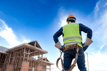 The construction engineer supervises the construction site.